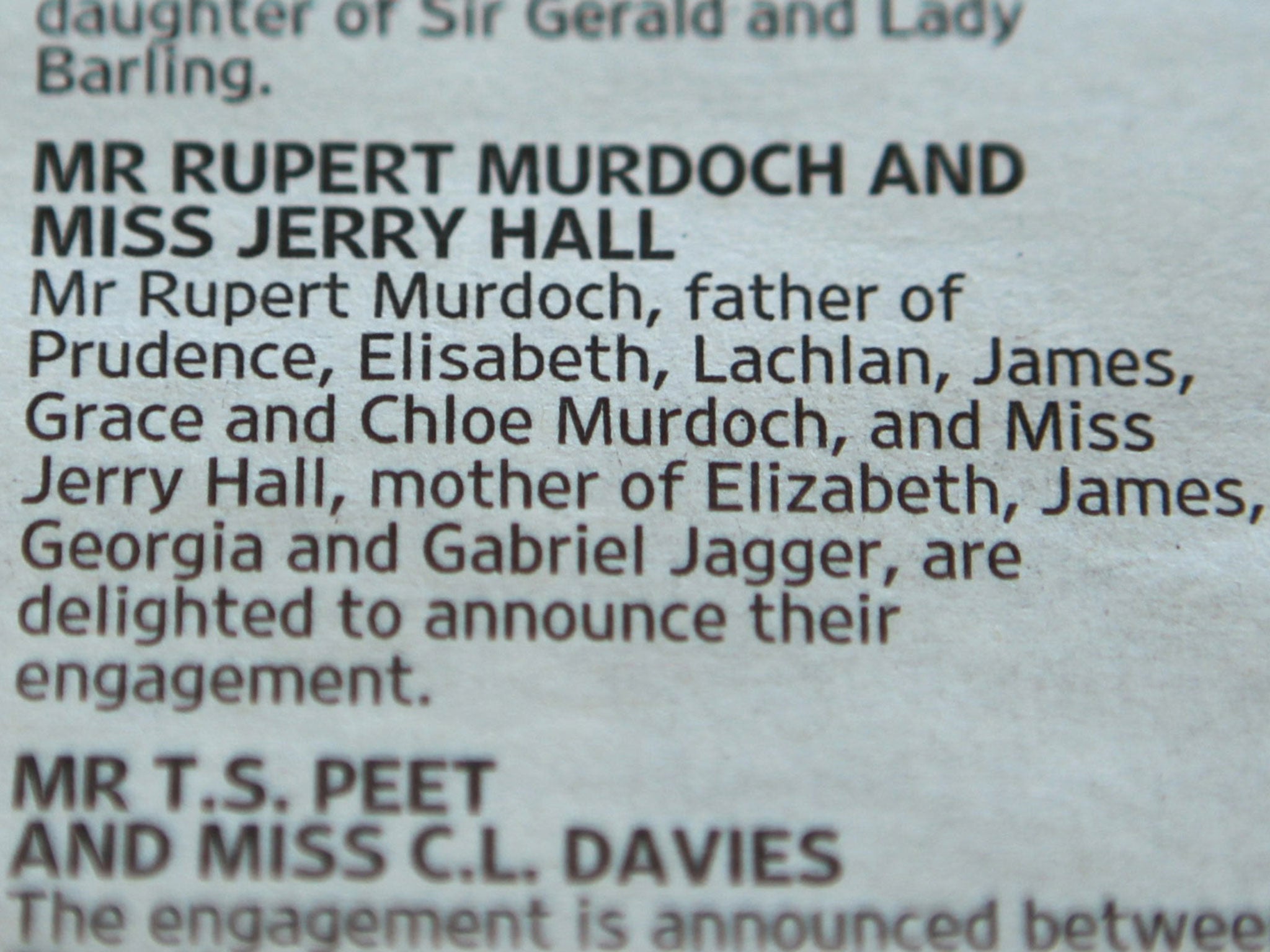 &#13;
Australian media baron Rupert Murdoch and former model Jerry Hall announce their engagement in 'Forthcoming Marriages' section of The Times, 12 January, 2016 in London&#13;