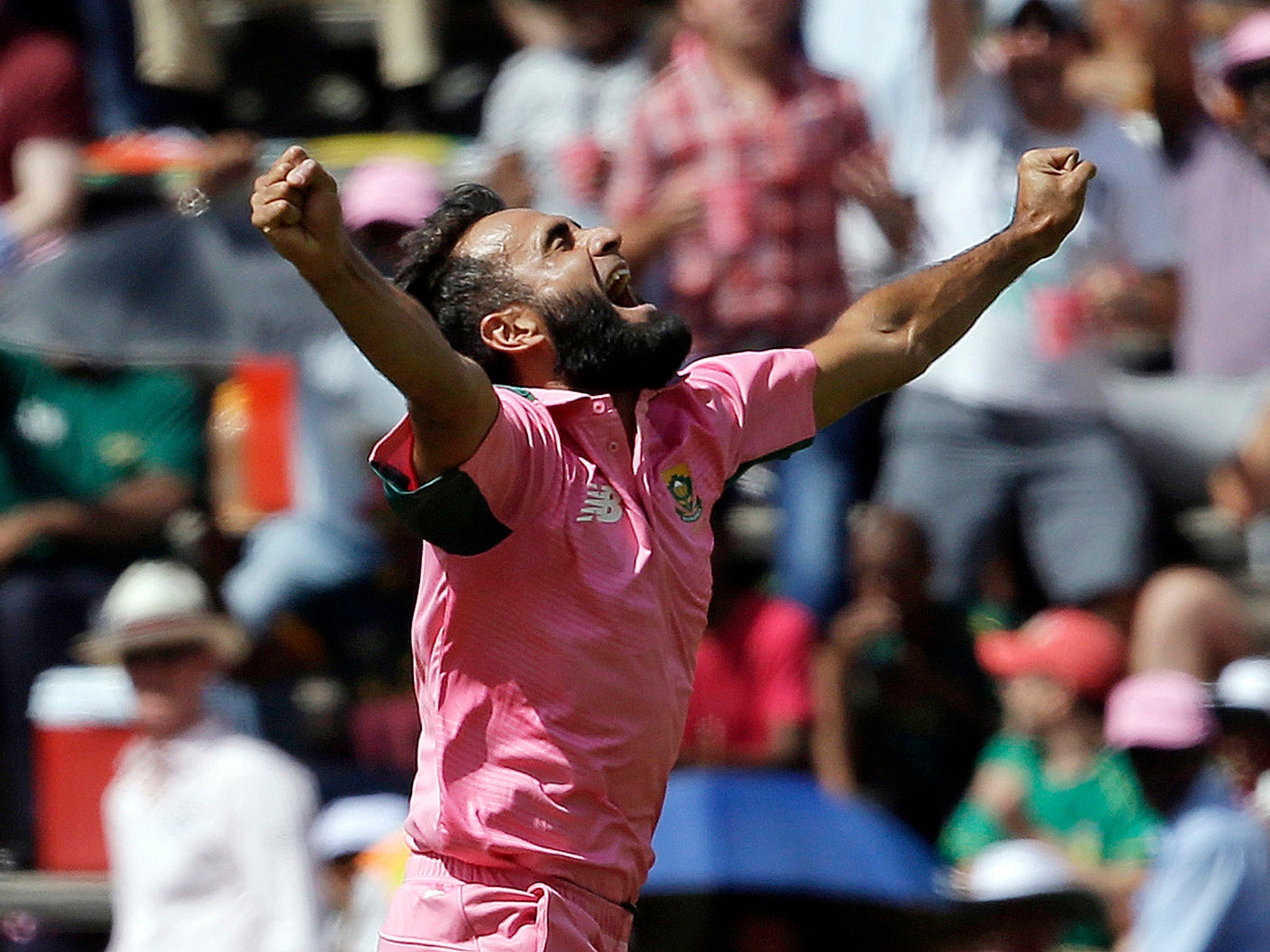 South Africa's bowler Imran Tahir, celebrates after dismissing England's batsman Ben Stokes, for 2 runs during the 4th One Day International cricket match between South Africa and England