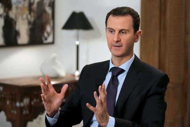 Syrian President Bashar al-Assad during an interview with AFP in the capital Damascus