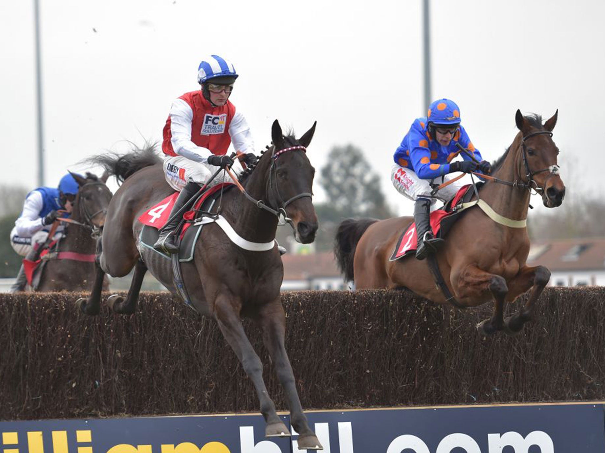 Josses Hill (left) en route to winning the graduation chase at Kempton