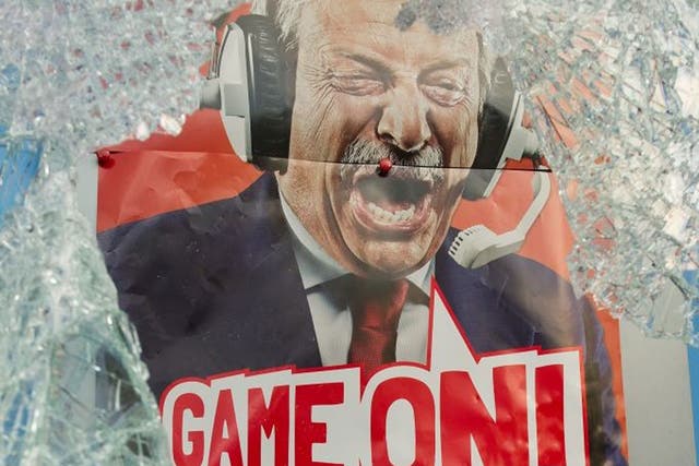 An advert for a bookmaker viewed through smashed glass. Depending on the profile of their area, councils will be able to put conditions on licences for betting outlets