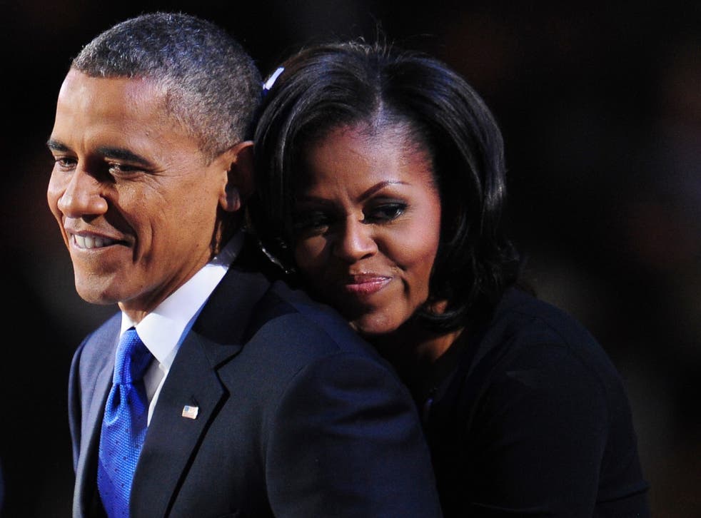 Barack and Michelle Obama celebrating after his re-election in 2012