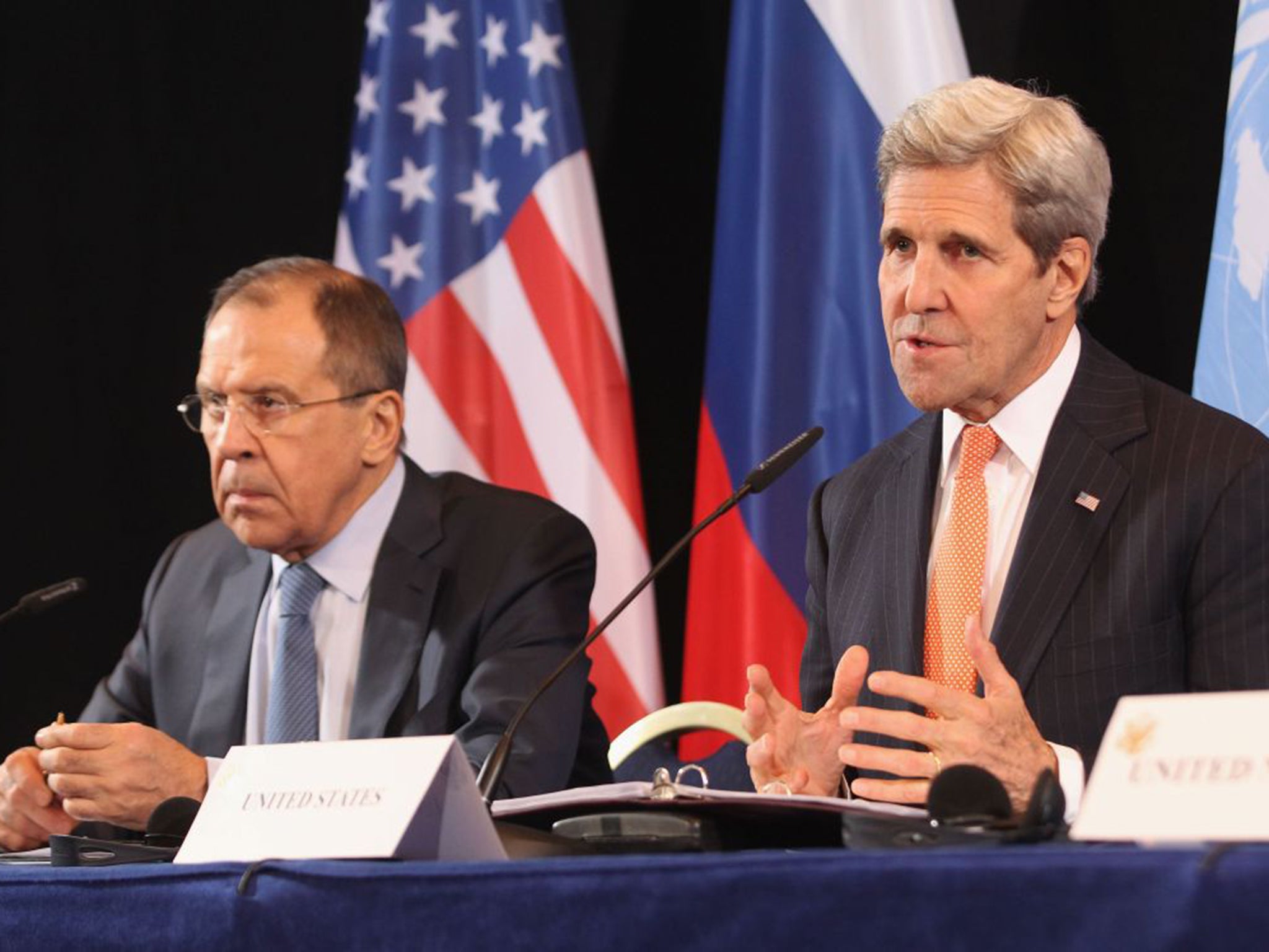 Russia’s Sergei Lavrov, left, and the US’s John Kerry on Thursday