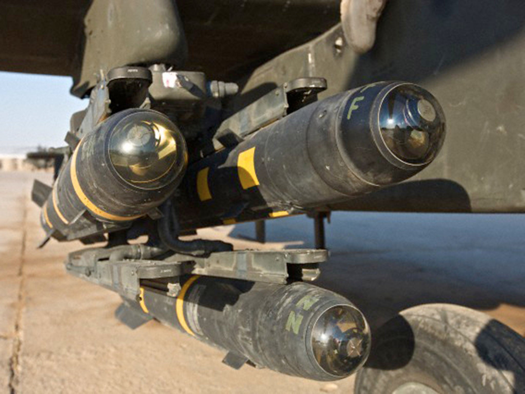 Close-up view of the Hellfire missiles on an AH-64D Apache Longbow helicopter