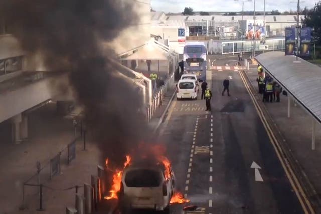 Taxi on fire at Glasgow airport