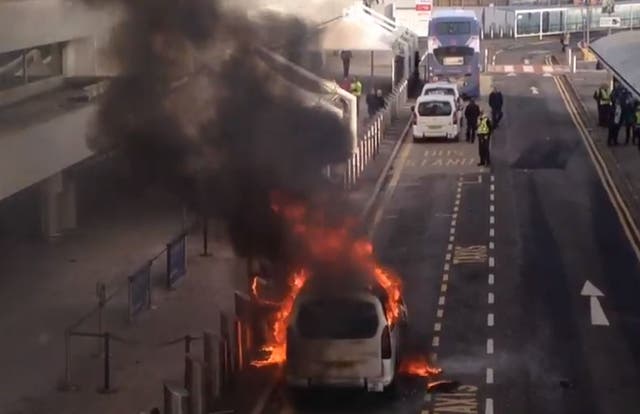 Black smoke reached several stores high after an electrical fault set a taxi on fire
