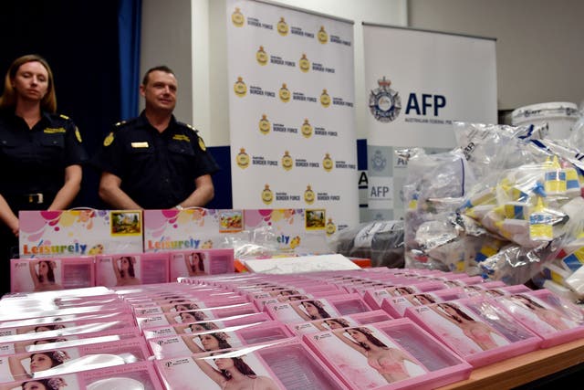 Gel bra inserts (foreground L) containing concealed crystal methamphetamine seen at the Australian Federal Police headquarters in Sydney on February 15, 2016
