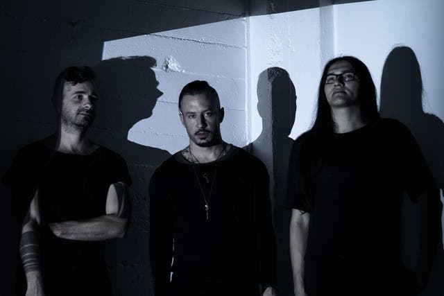 The Black Queen, from left to right, Joshua Eustis, Greg Puciato and Steven Alexander
