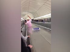 Officials denounce video of passenger sliding down Tube escalator