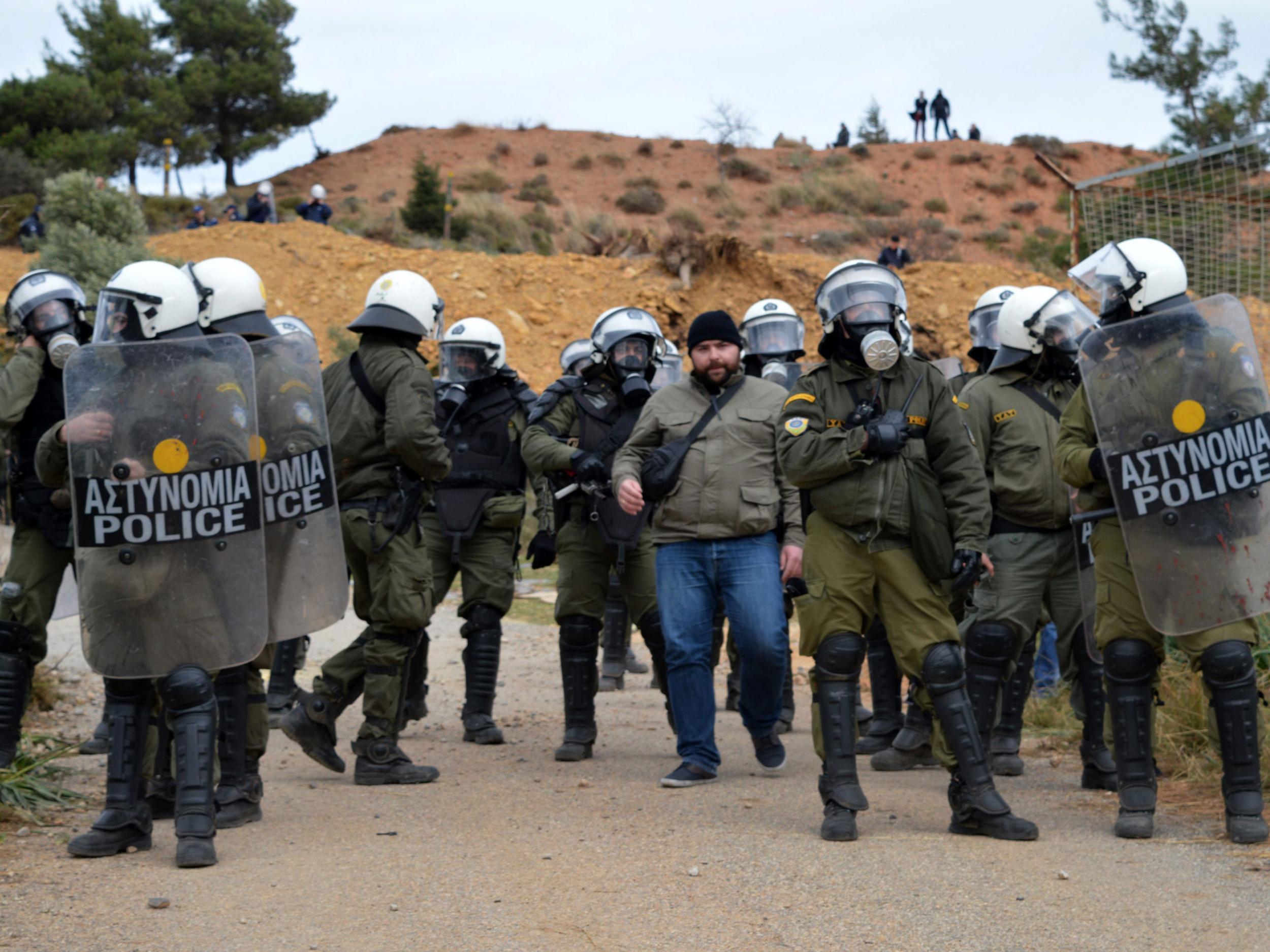 Riot Police protect the area of Pyli during a demonstration on the island of Kos