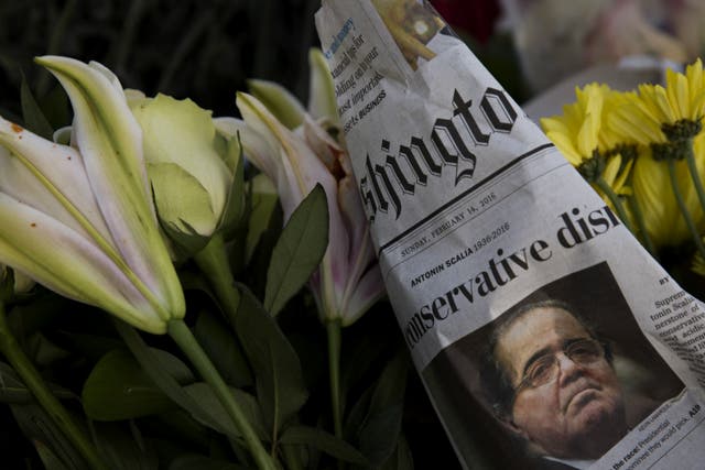 A makeshift memorial for Supreme Court Justice Antonin Scalia is seen at the U.S. Supreme Court, February 14, 2016 in Washington, DC