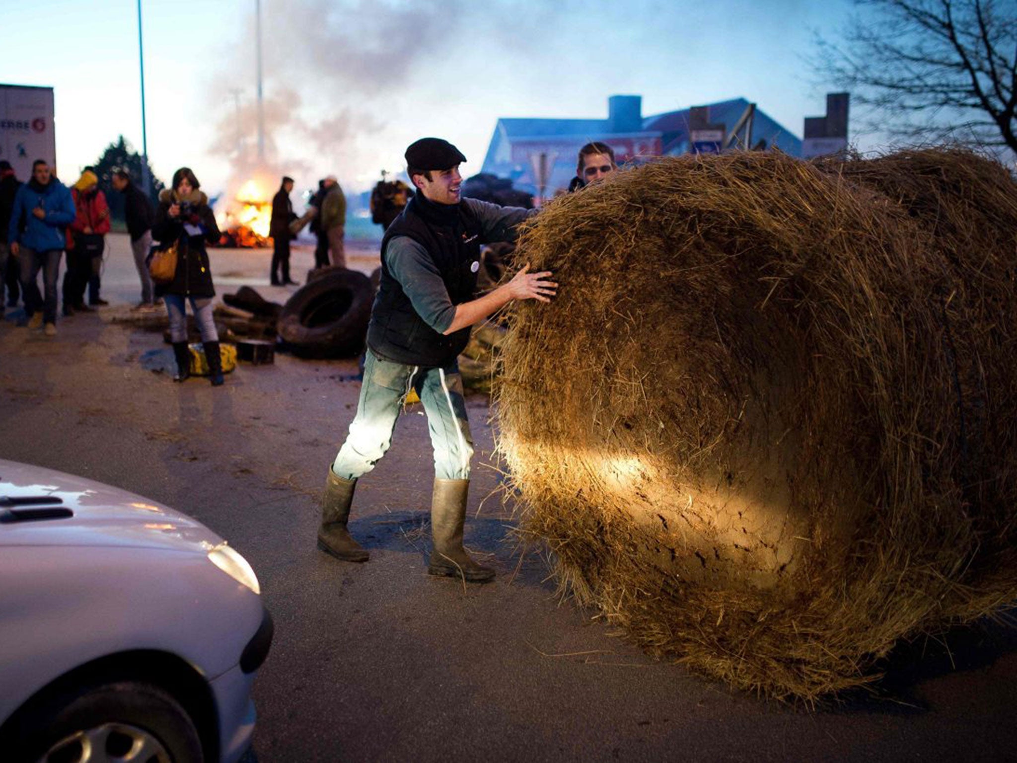 A farmer attempts to block access to Vannes on Monday