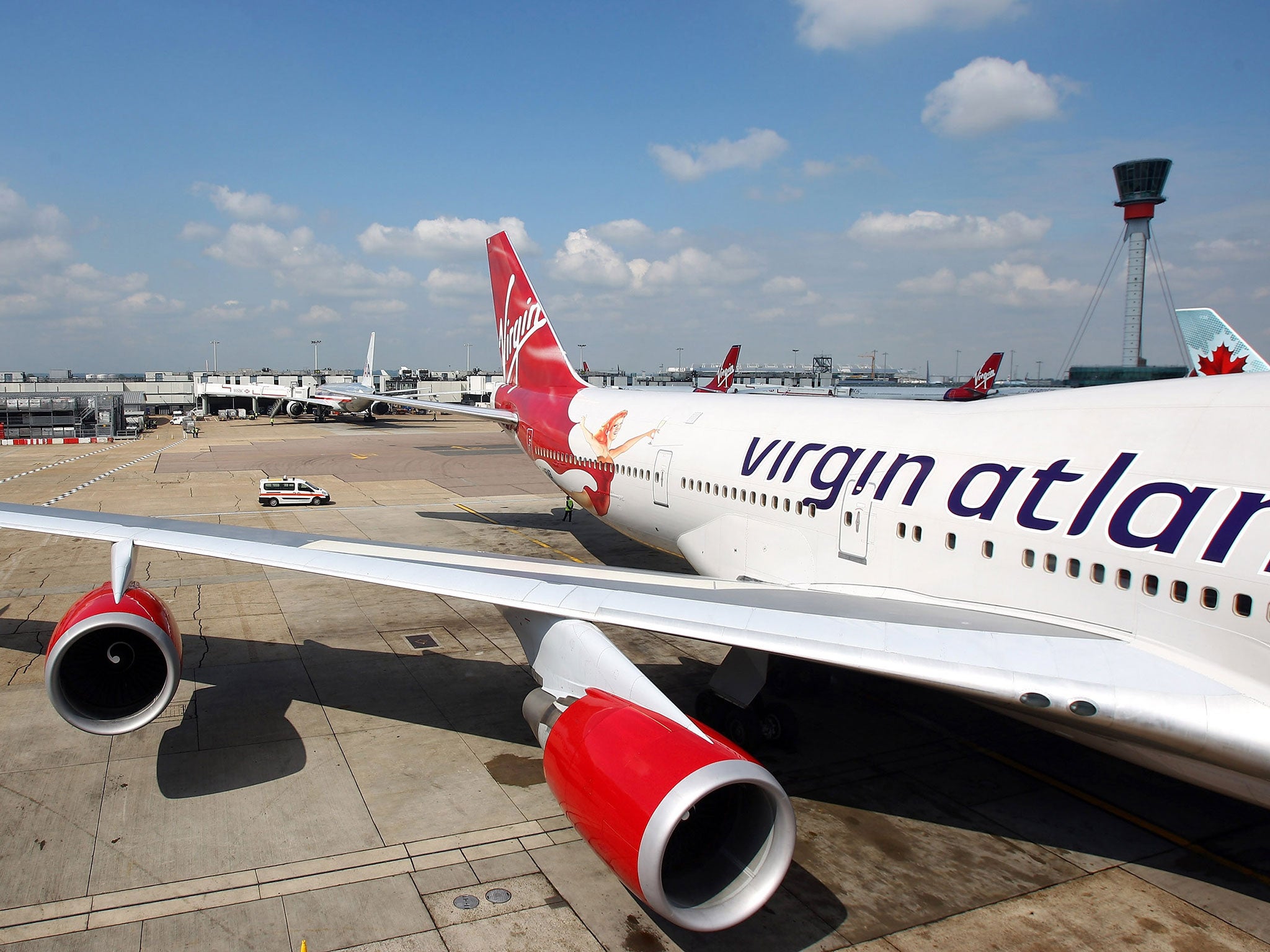 A Virgin Atlantic plane was forced to return to Heathrow when a co-pilot suffered ill-effects from a laser directed at the cockpit
