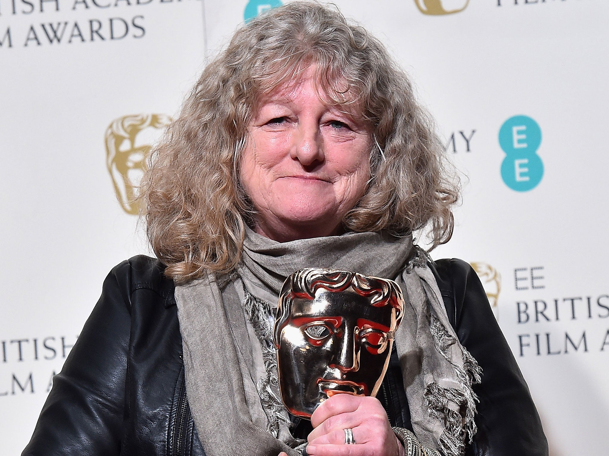 Jenny Beavan poses with the Best Costume Design Award for 'Mad Max: Fury Road' in the winners room at the EE British Academy Film Awards at the Royal Opera House on 14 February, 2016
