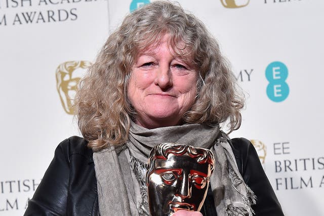 Jenny Beavan poses with the Best Costume Design Award for 'Mad Max: Fury Road' in the winners room at the EE British Academy Film Awards at the Royal Opera House on 14 February, 2016