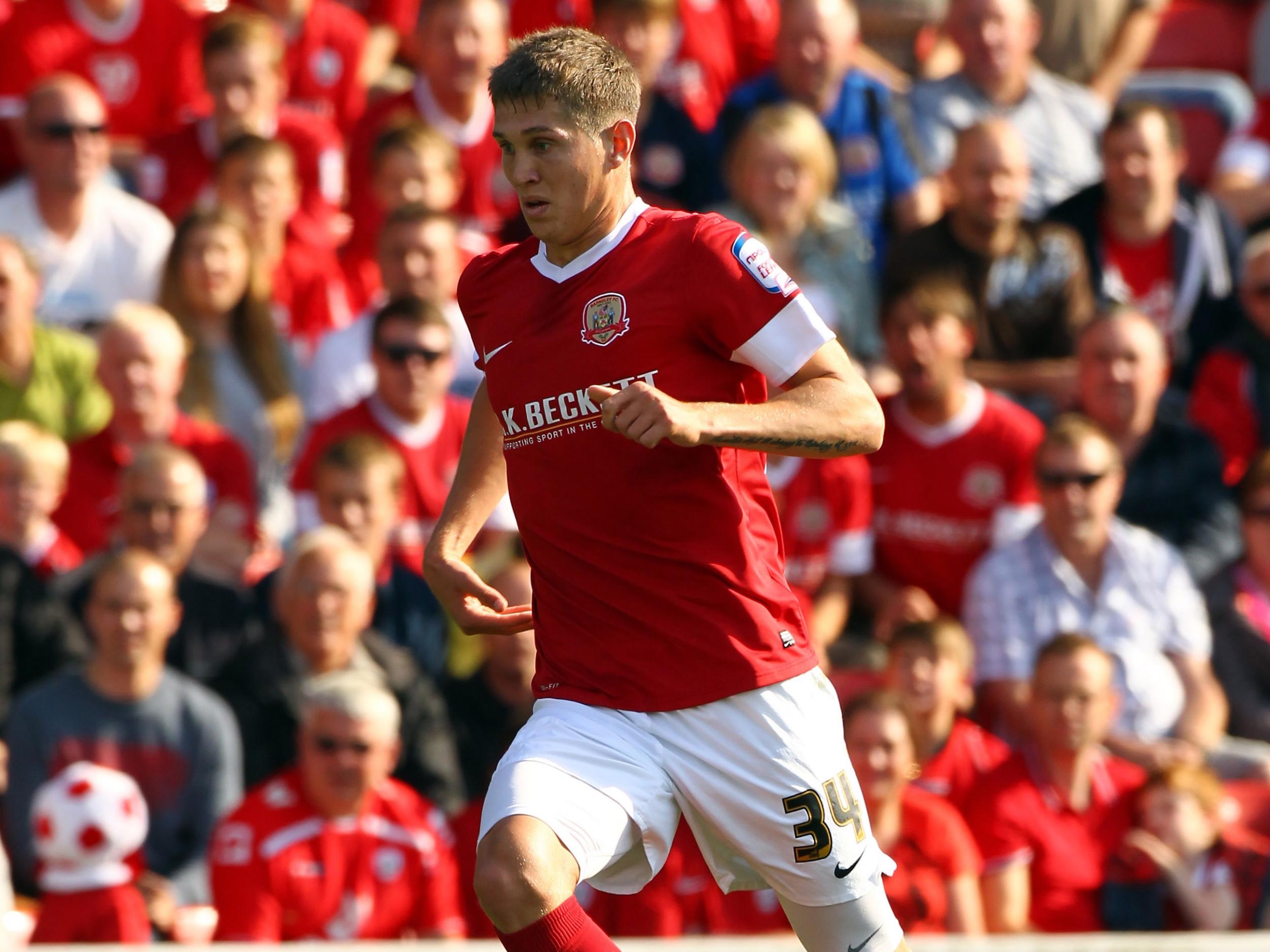 John Stones in action for Barnsley before his switch to Everton