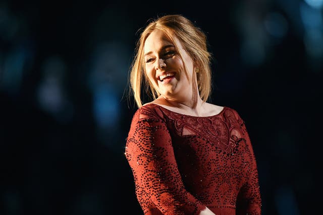 Adele performs at the 58th Grammy Awards.
