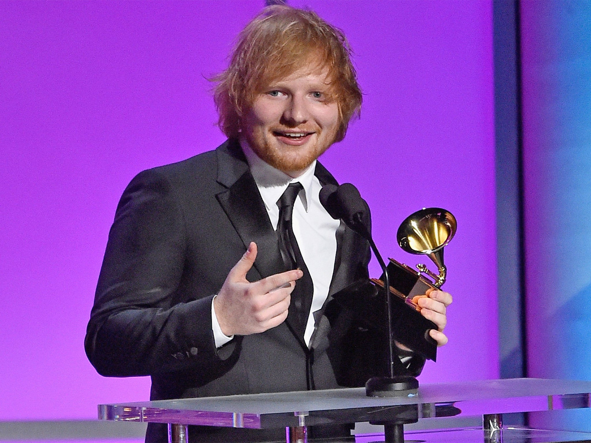 Ed Sheeran receives the gong for Best Pop Solo Performance, for "Thinking Out Loud," at the Grammys on Monday night