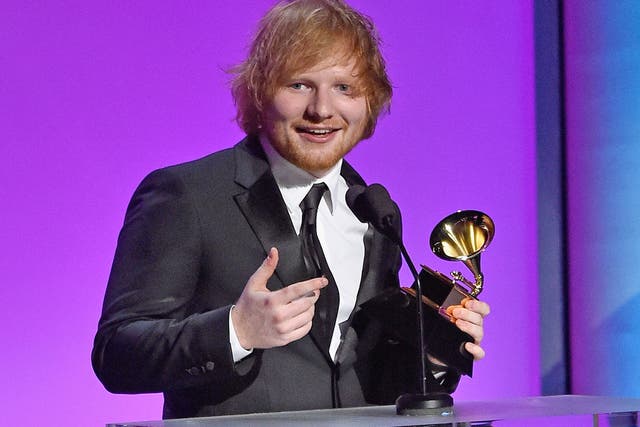 Ed Sheeran receives the gong for Best Pop Solo Performance, for "Thinking Out Loud," at the Grammys on Monday night