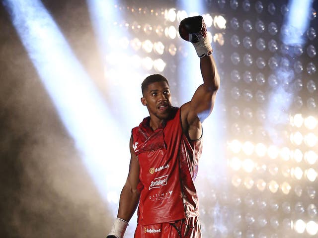Anthony Joshua walks to the ring before his fight against Dillian Whyte