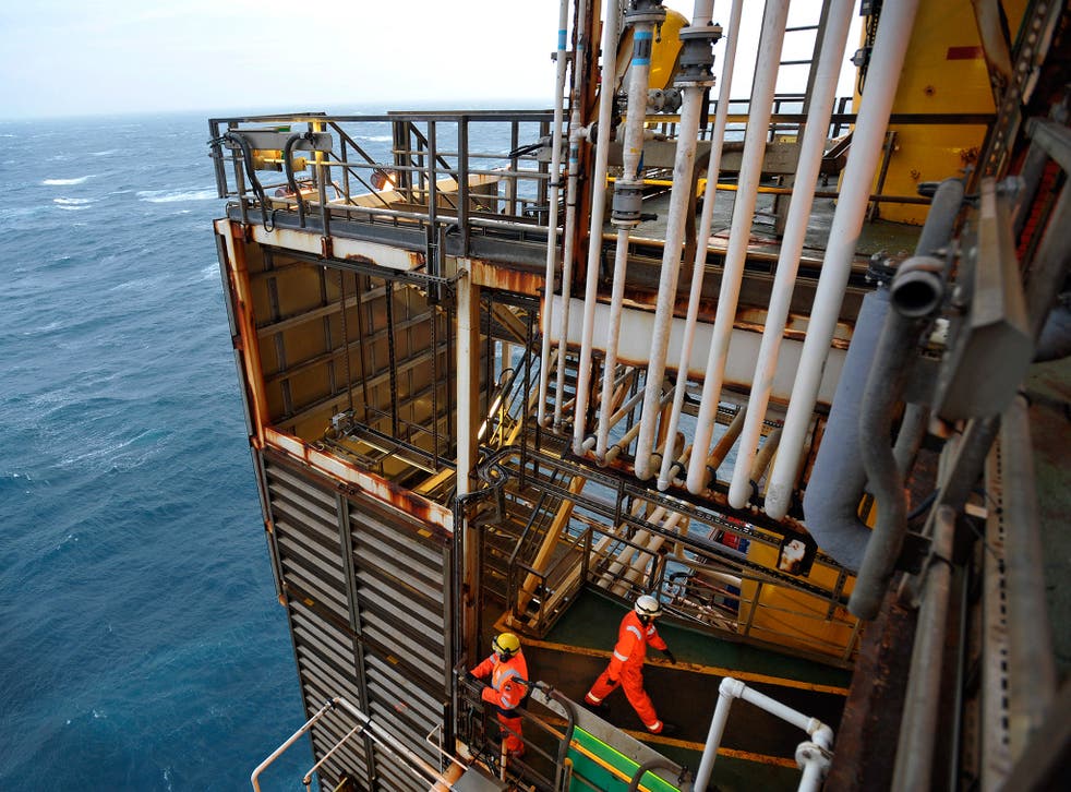 Workers on an oil platform in the North Sea, around 100 miles east of Aberdeen, Scotland
