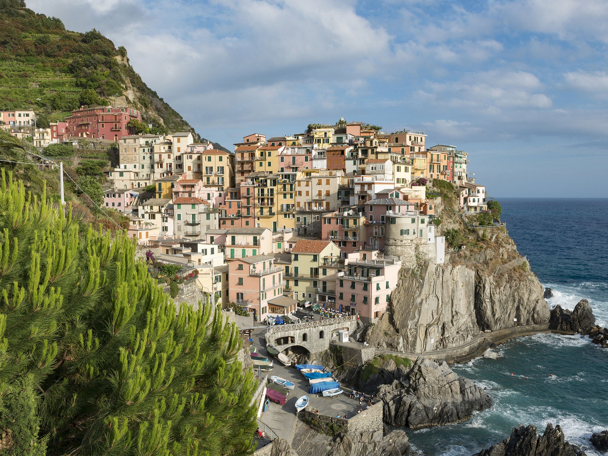 The visually spectacular coastline of Cinque Terre National Park in Liguria, Italy, is a Unesco World Heritage Site