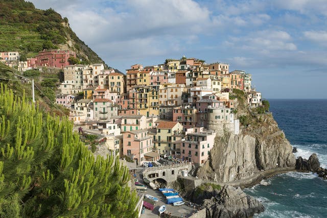 The visually spectacular coastline of Cinque Terre National Park in Liguria, Italy, is a Unesco World Heritage Site