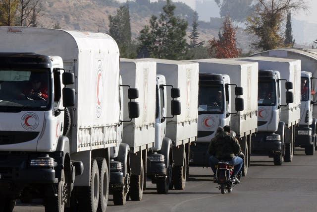 A convoy of aid from the Syrian Arab Red Crescent leaves the capital Damascus for the besieged rebel-held Syrian town of Madaya, on 14 January, 2016