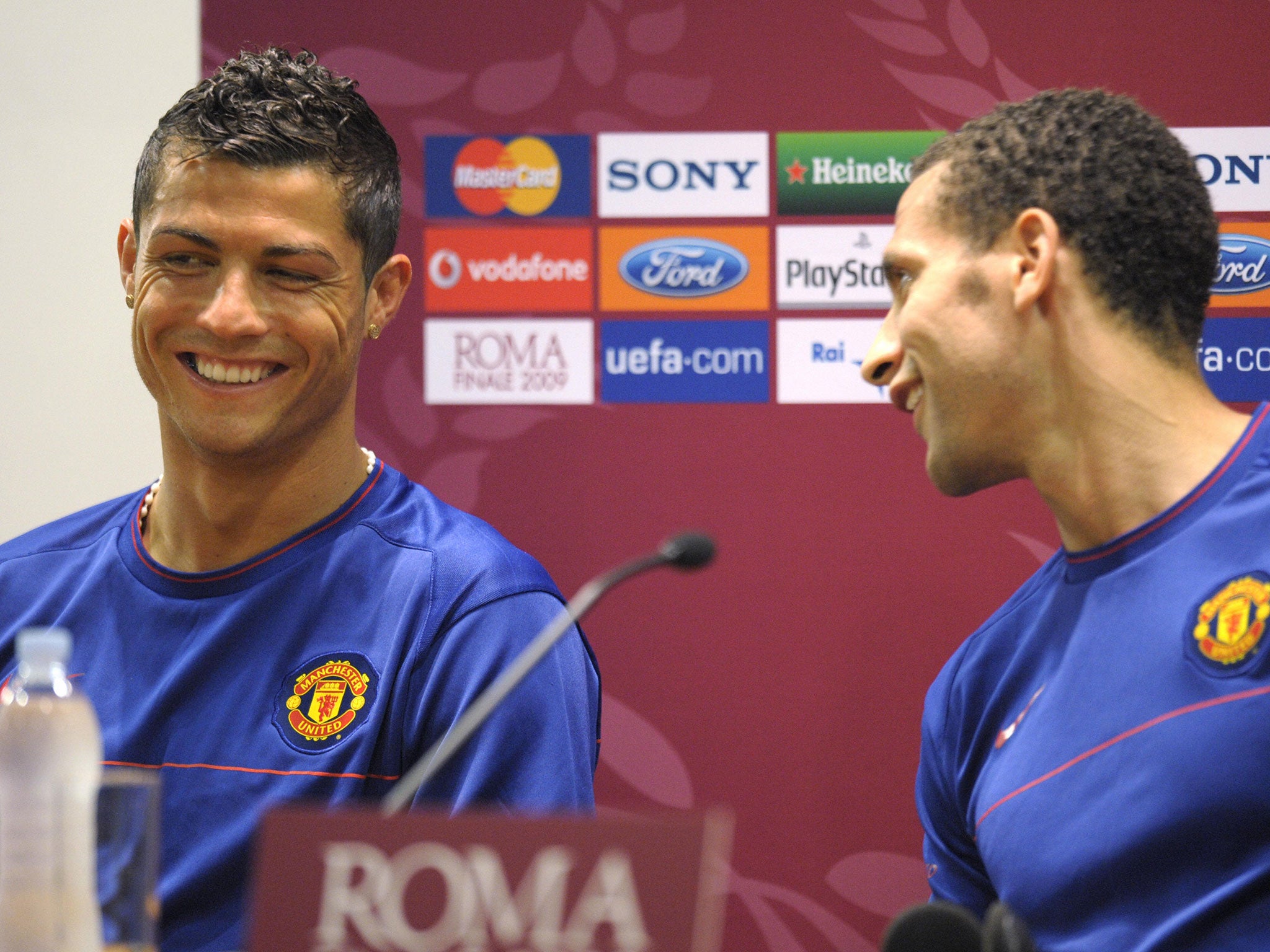 Cristiano Ronaldo alongside Rio Ferdinand during their time at Manchester United