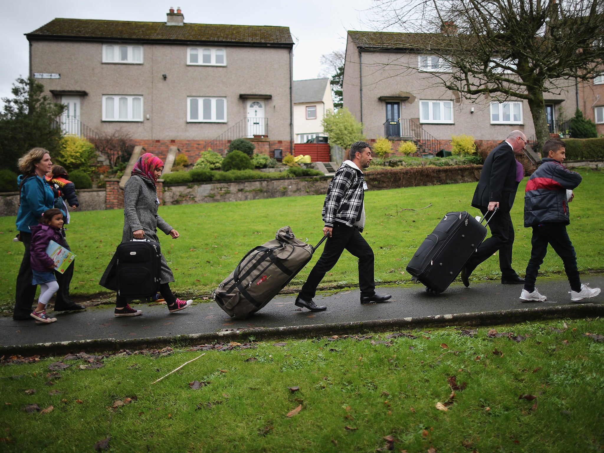 Syrian refugee families arrive at their new homes on the Isle of Bute on December 4, 2015 in Rothesay, Isle of Bute, Scotland.