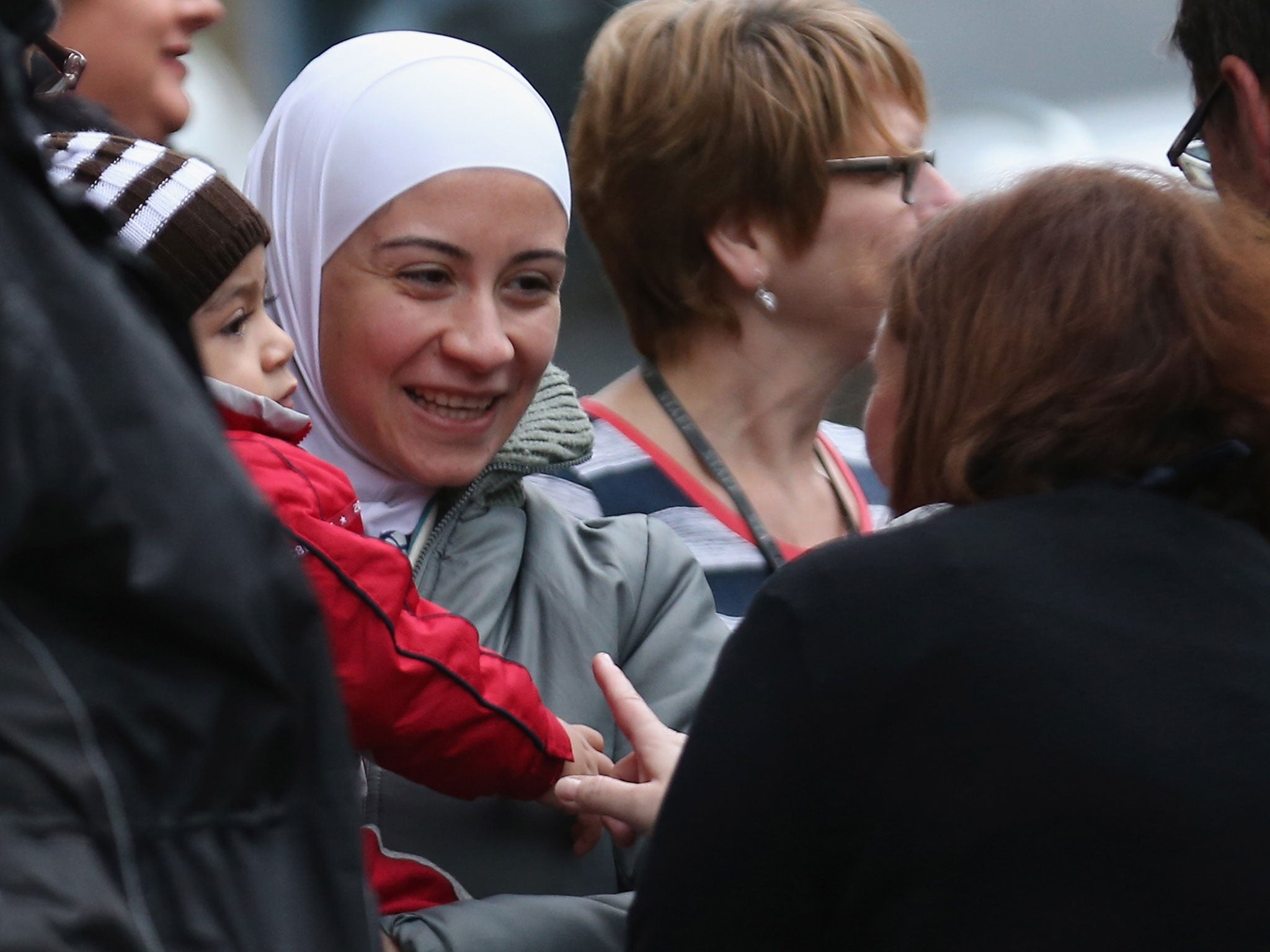 Syrian refugee families arrive at their new homes on the Isle of Bute on December 4, 2015 in Rothesay, Isle of Bute, Scotland.