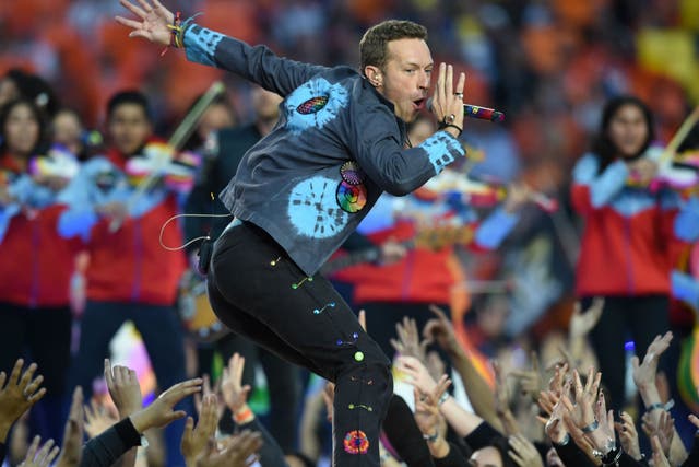 Coldplay's Chris Martin performs at the Super Bowl 50 before being announced as Glastonbury headliner