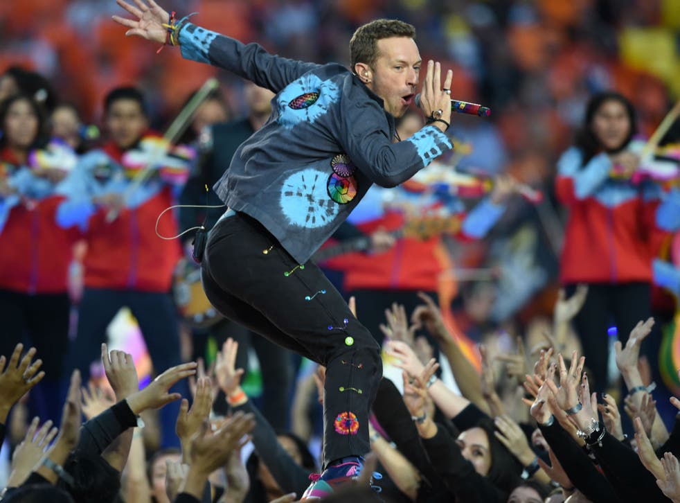 Coldplay's Chris Martin performs at the Super Bowl 50 before being announced as Glastonbury headliner