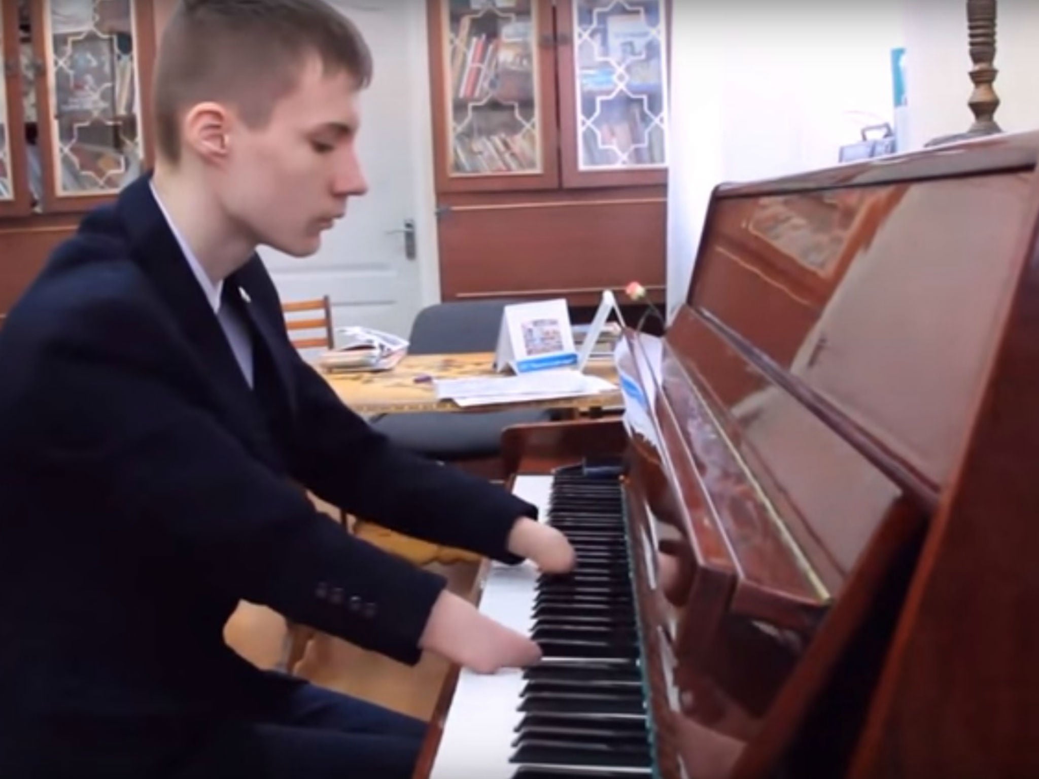 Alexey Romanov, 15,only started reading music three weeks ago