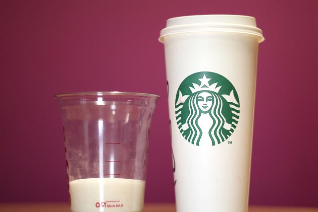 A cup of Starbucks' venti Grape with Chai, Orange and Cinnamon Hot Mulled Fruit which has a total of 25 teaspoons of sugar per serving