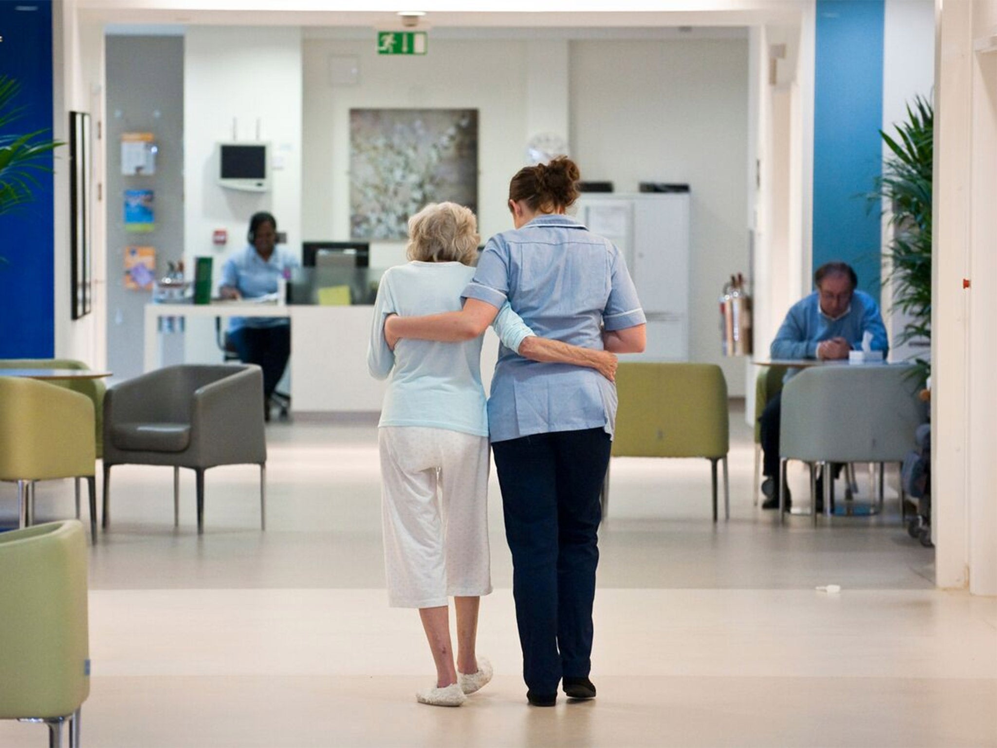 Care values: a patient and nurse at Royal Trinity Hospice