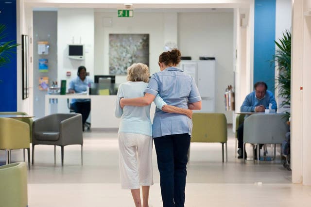 Care values: a patient and nurse at Royal Trinity Hospice