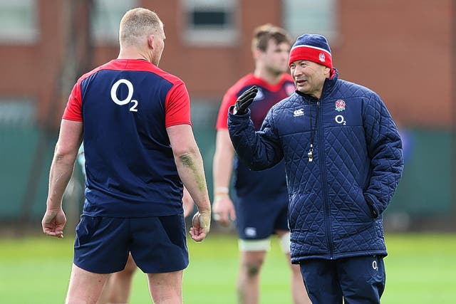 England coach Eddie Jones talks with captain Dylan Hartley