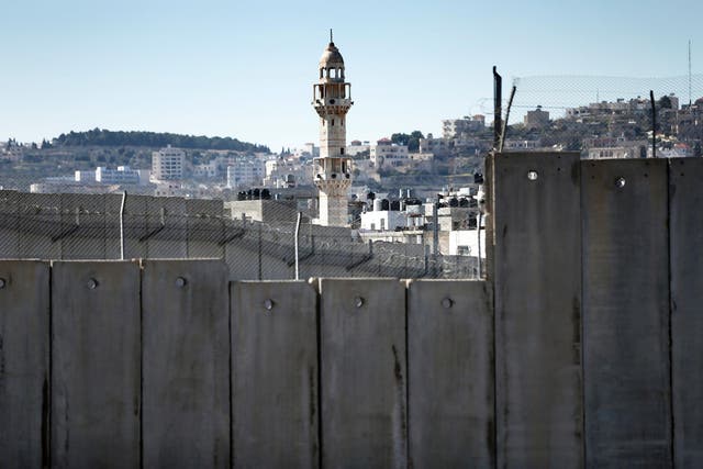 Israel's controversial separation barrier dividing Jerusalem and the West Bank town of Bethlehem, on February 12, 2016