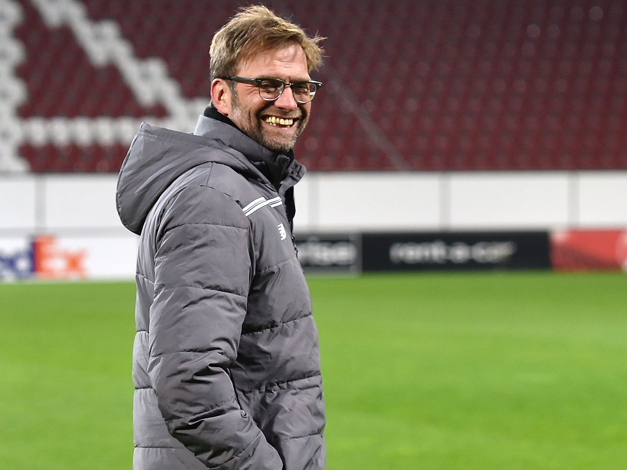 Jurgen Klopp smiles during a Liverpool training session in Augsburg