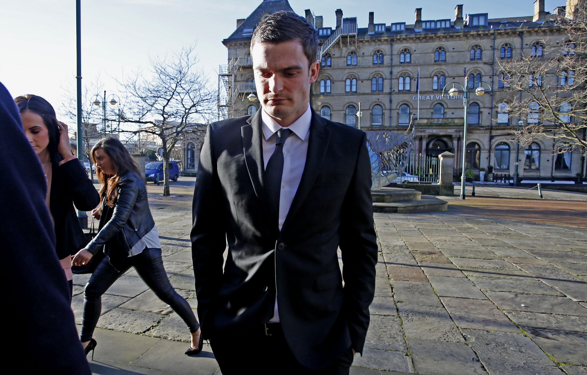 England footballer Adam Johnson, who has been capped 12 times, arrives at Bradford Crown Court