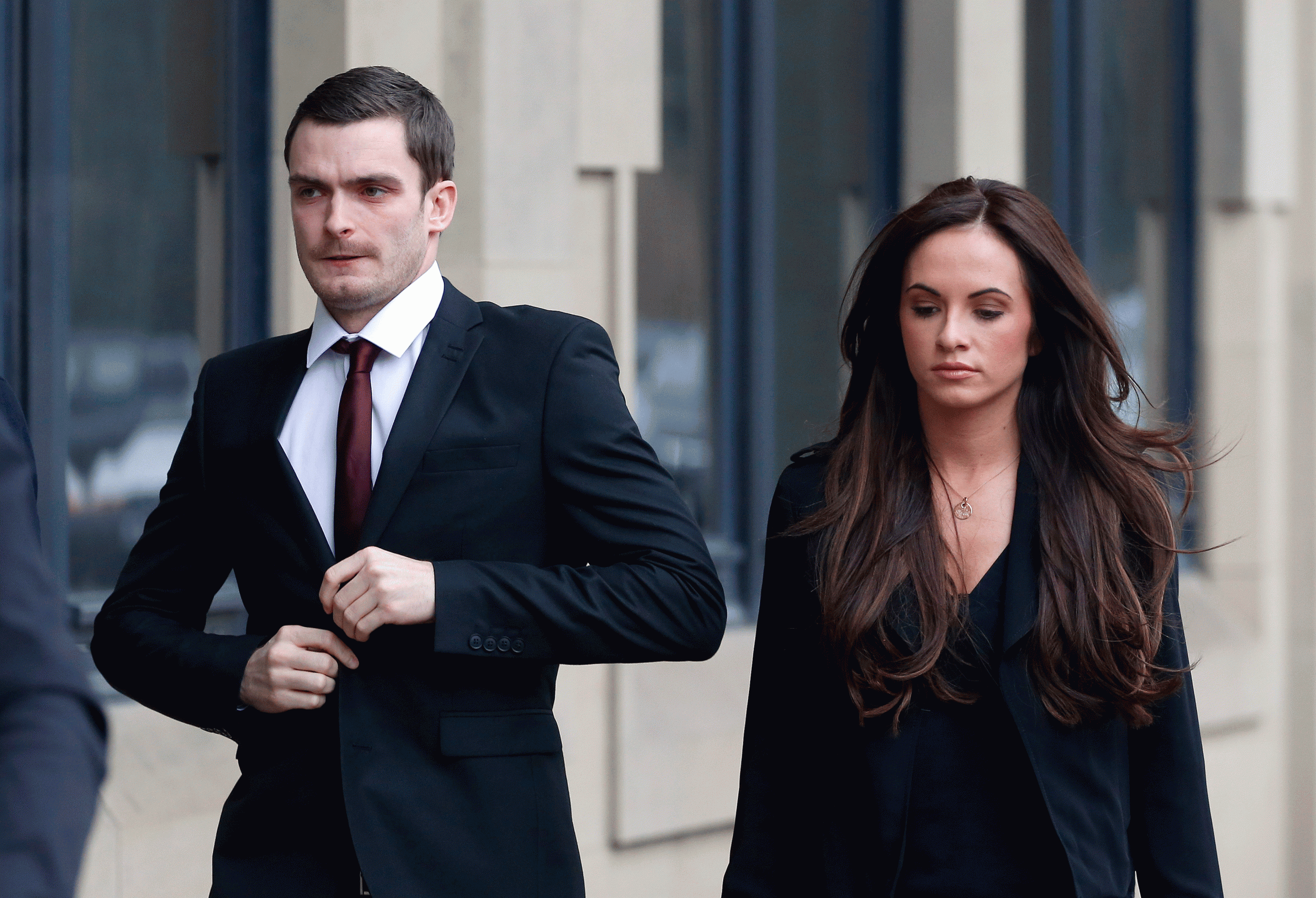 England footballer Adam Johnson, 28, arrives with partner Stacey Flounders at Bradford Crown Court, Bradford, where he will go on trial accused of sexual activity with a child