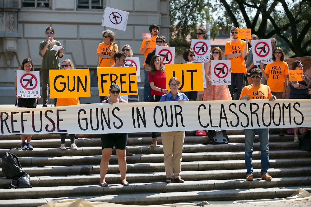 University of Texas President Gregory Fenves reluctantly approved a measure to allow licensed concealed weapons in his campus classrooms