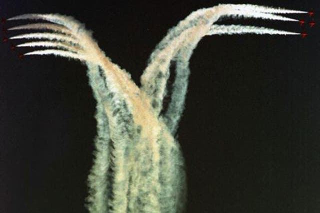 BAE Hawks, used by the Red Arrows,  stage a flyover in Egypt in 2003