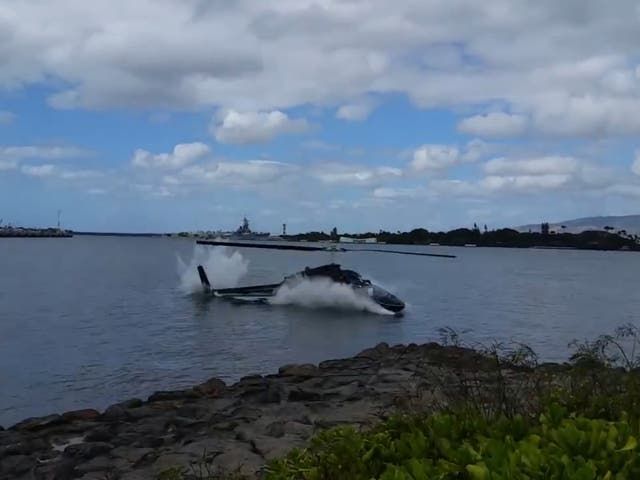 Teenager in critical condition after helicopter crashes in water near Pearl Harbour
