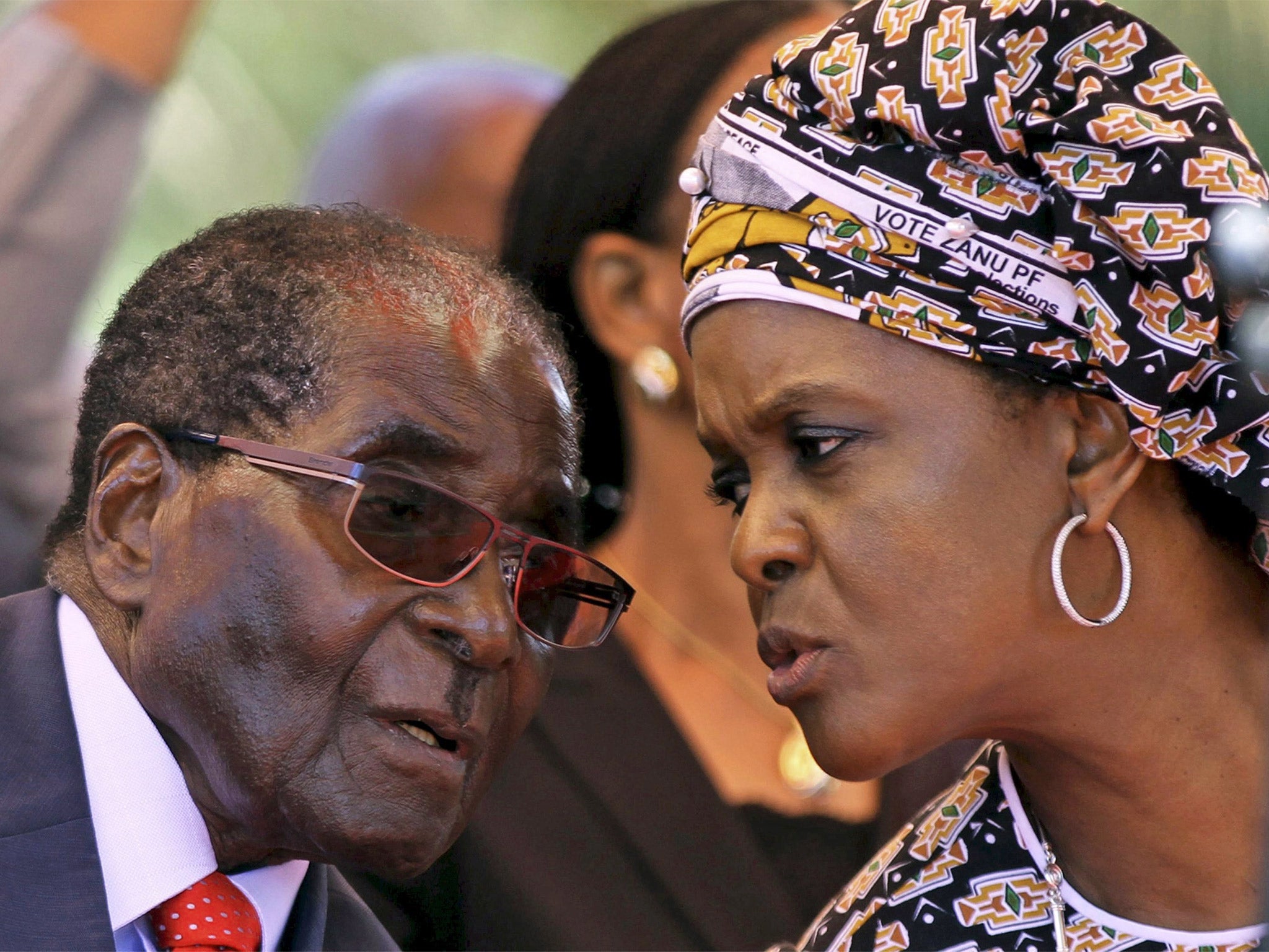 Mr Mugabe before an address to the Politbuo this month in Harare, with his wife Grace