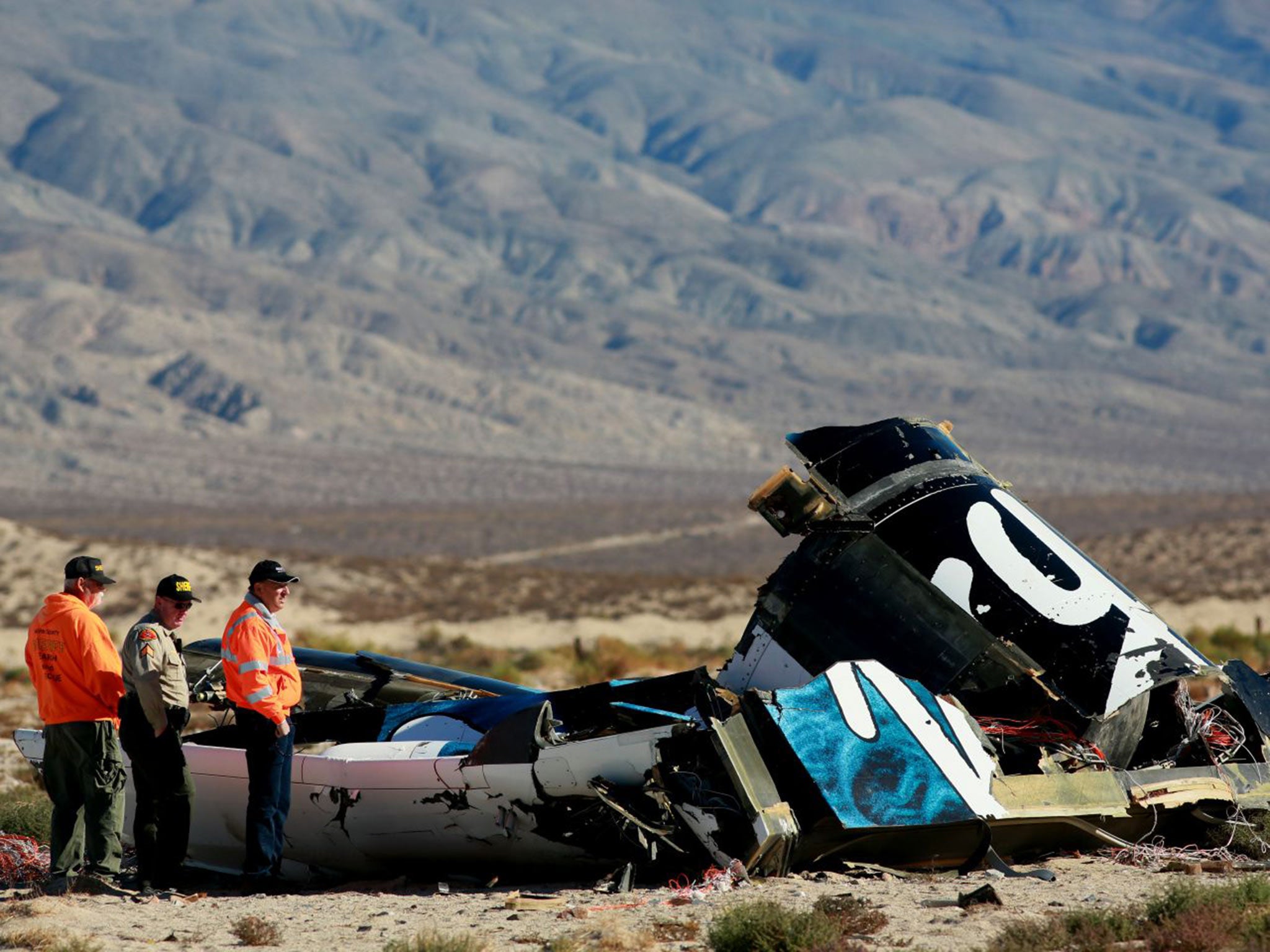 Wreckage of the first Virgin Galactic SpaceShipTwo is inspected in the Californian desert after it crashed on 31 October 2014