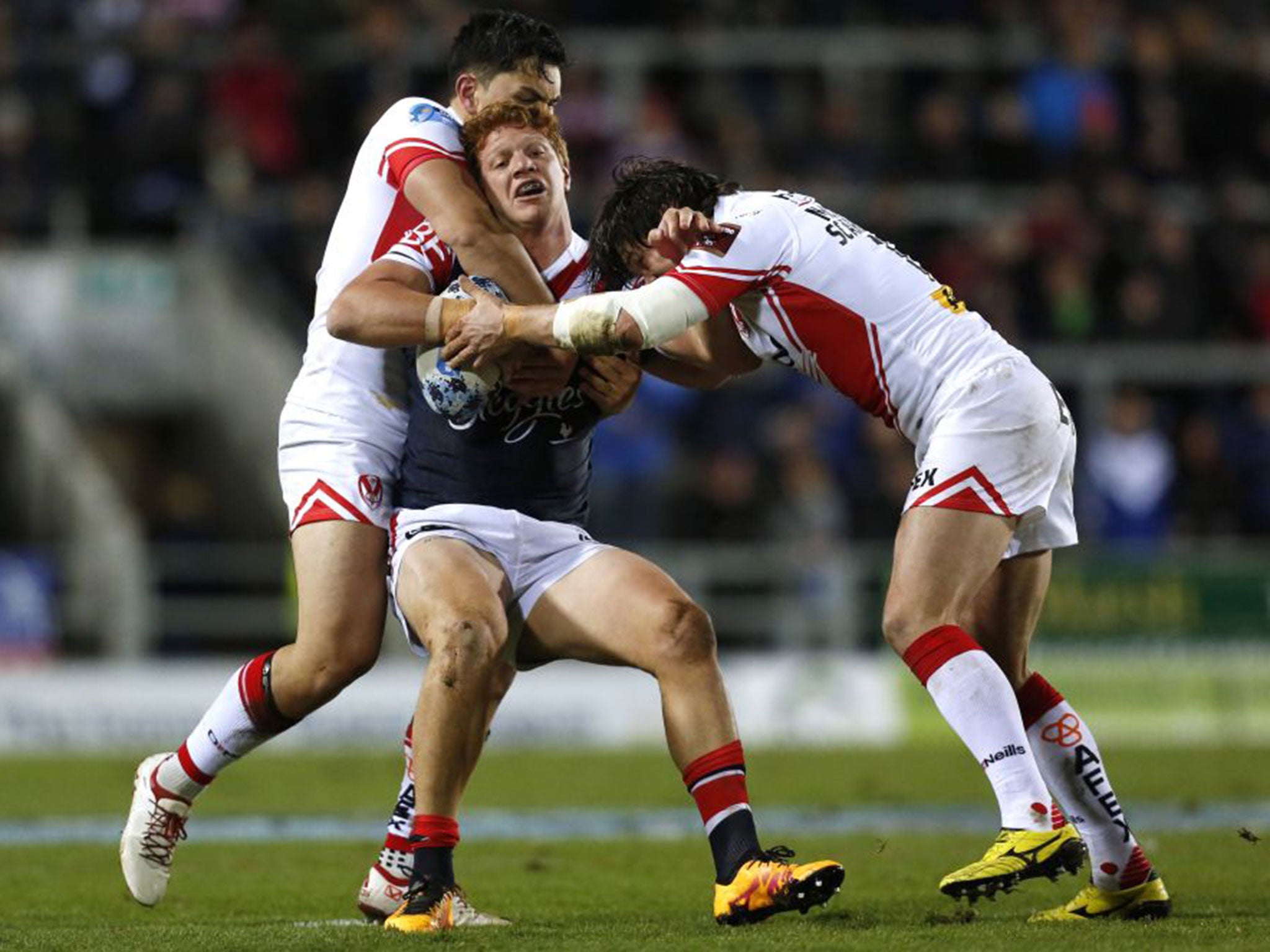 Sydney Roosters’ Dylan Napa is halted by St Helens