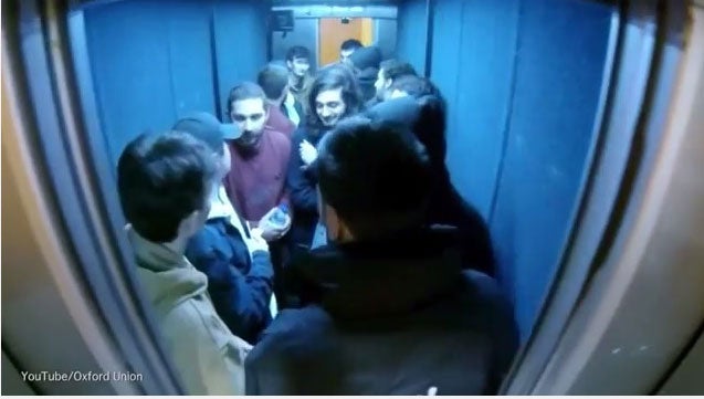 The man leaves the lift after asking LaBeouf to punch him