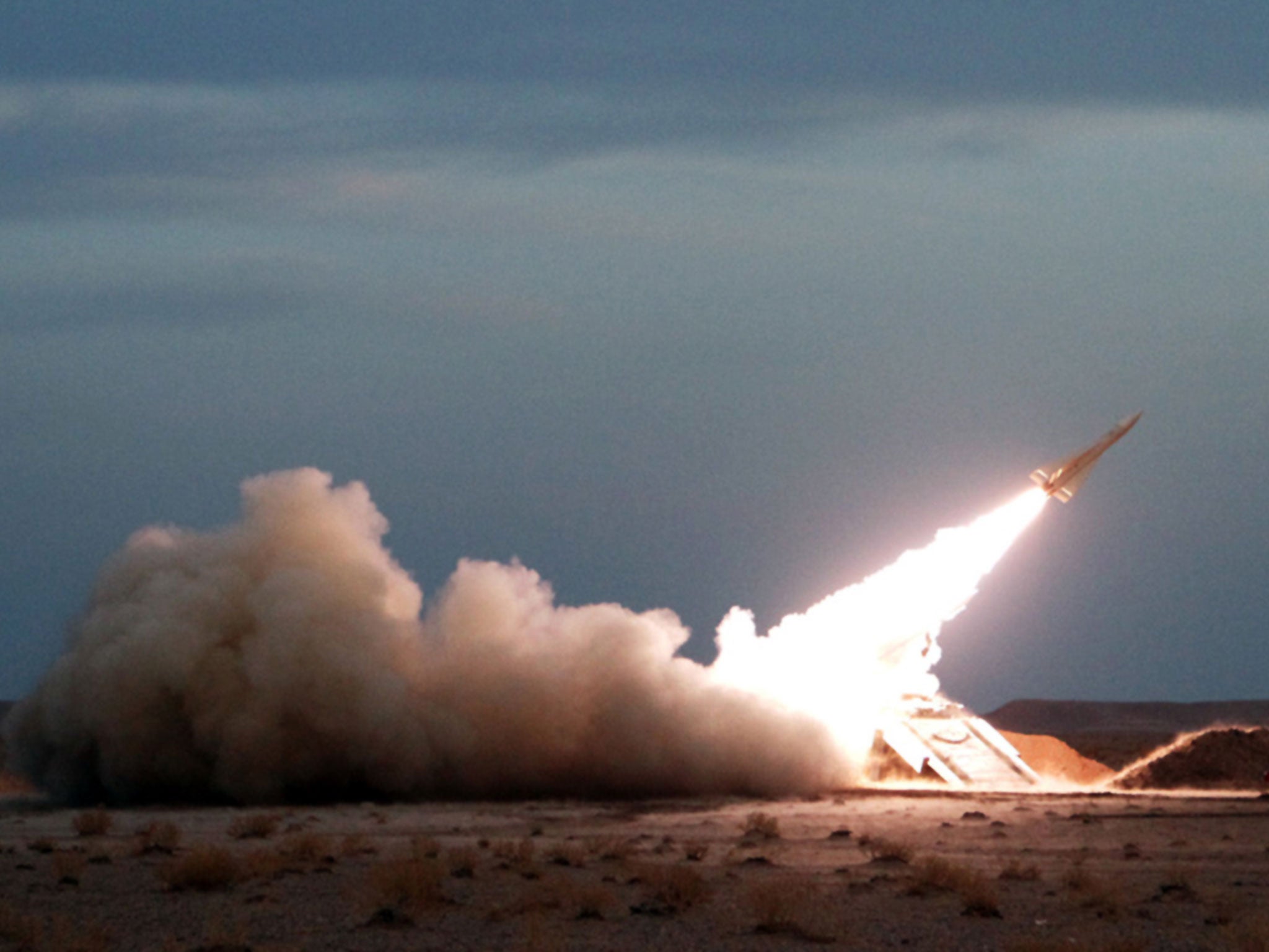 A Hawk surface-to-air missile is launched during military maneuvers at an undisclosed location in Iran on November 13, 2012.